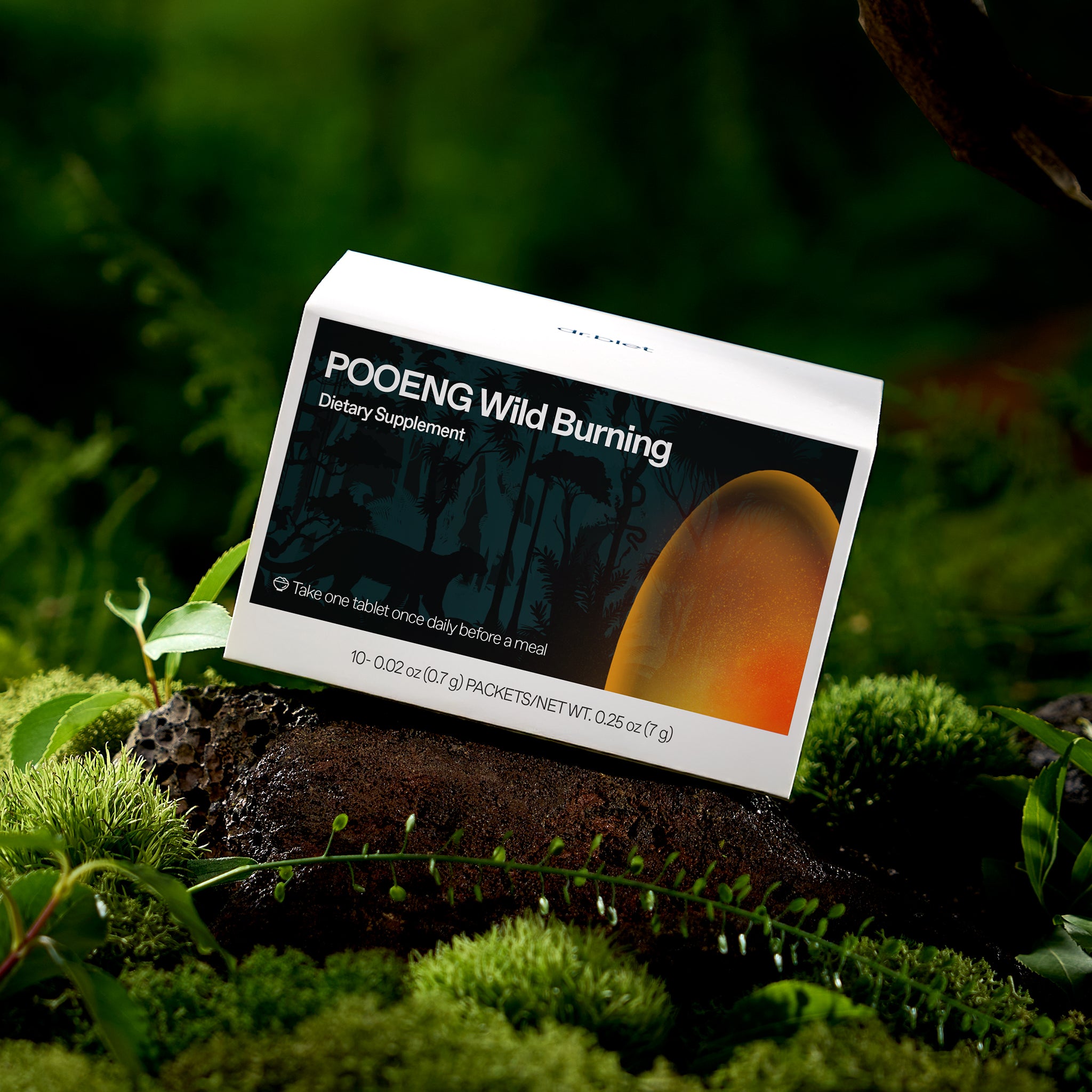 Supplement package labeled 'POOENG Wild Burning' on a natural background